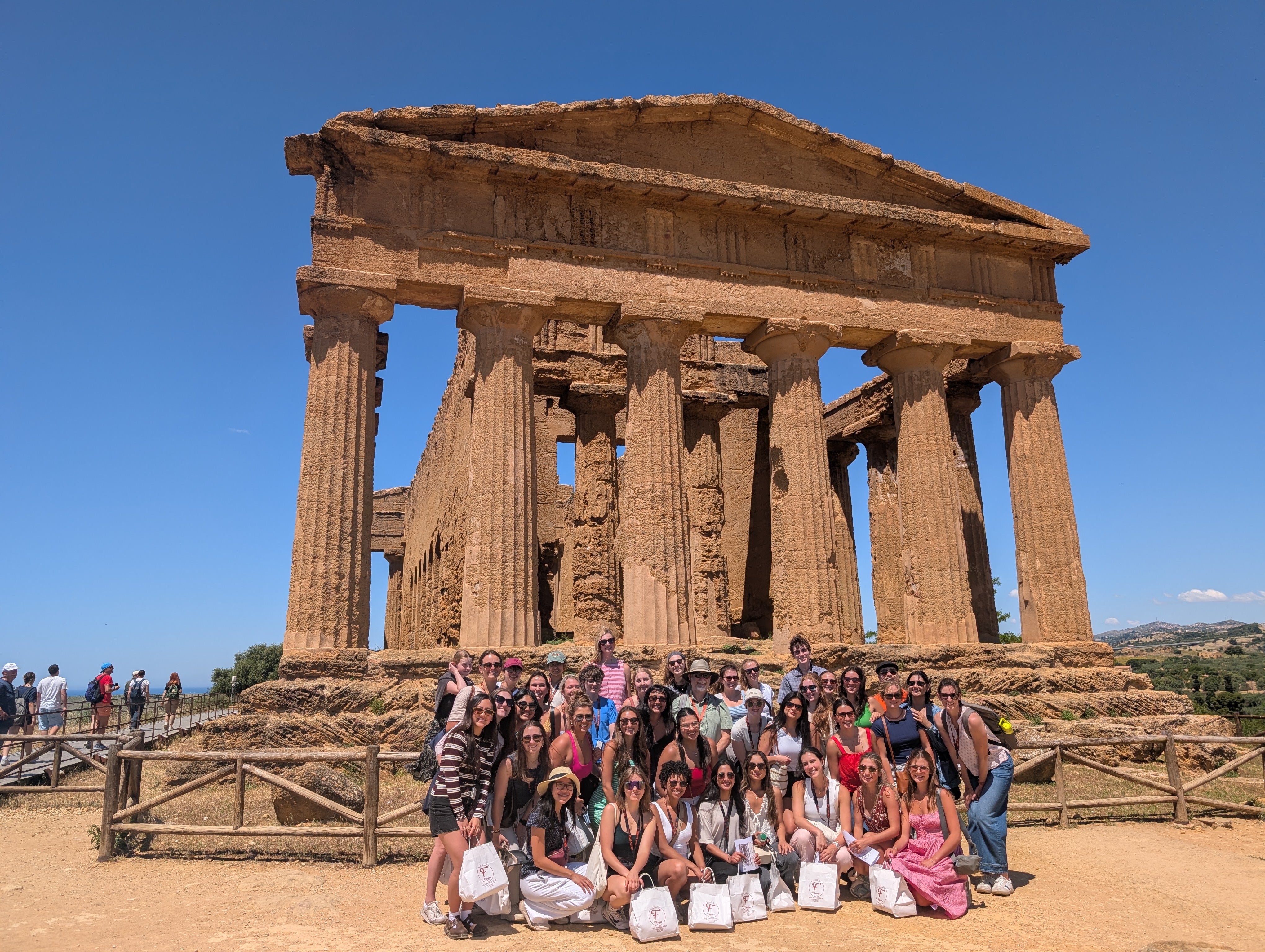 Students in front of Ancient ruins in Italy