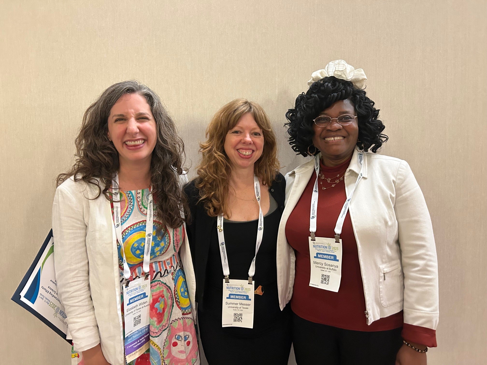 Photograph of Beth Widen, Summer Messer, and Mercy Sosanya at ASN